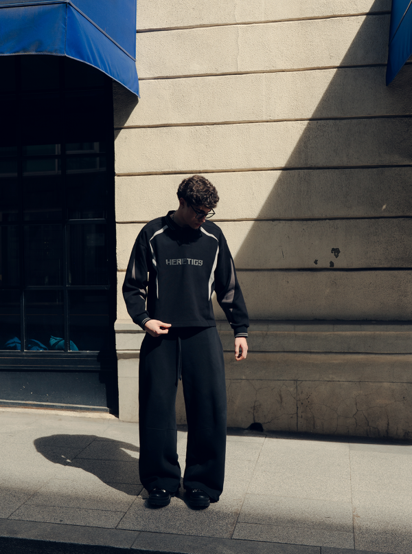 HERETICS 10 PANEL LONG SLEEVE POLO BLACK